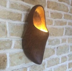 about me and my business - one of my unusual pieces, A wooden clog made into a wall light