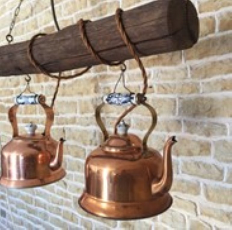 Upcycled Lighting - Copper Kettles suspended from a wooden beam