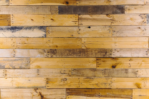 pick up an unloved and unused pallet. They're rustic, naturally aged and a great affordable alternative - especially if you can pick them up for free!